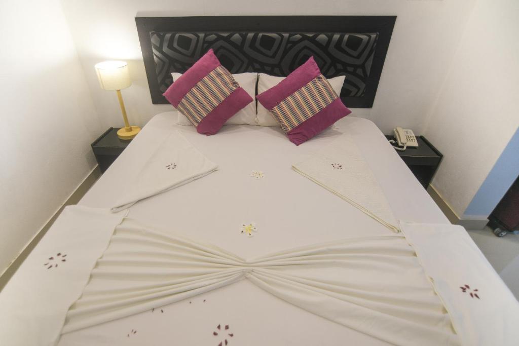 Postel nebo postele na pokoji v ubytování Azoush Tourist Guesthouse