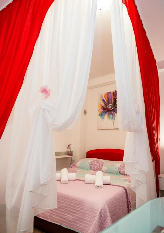 Postel nebo postele na pokoji v ubytování Studio apartman Mima