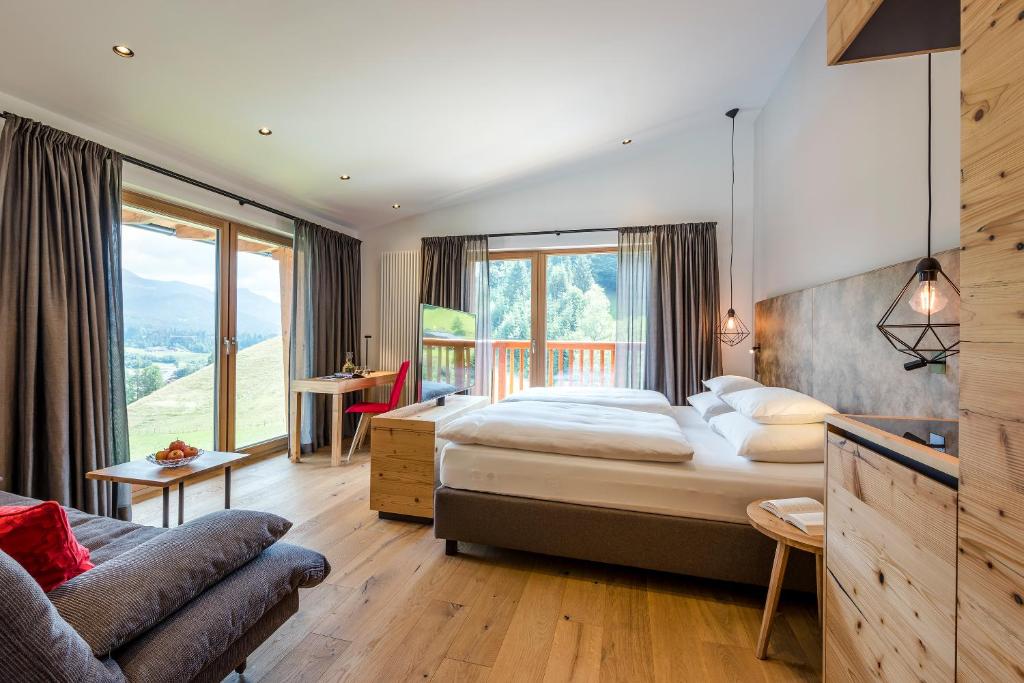 Posteľ alebo postele v izbe v ubytovaní Hotel Der Bär