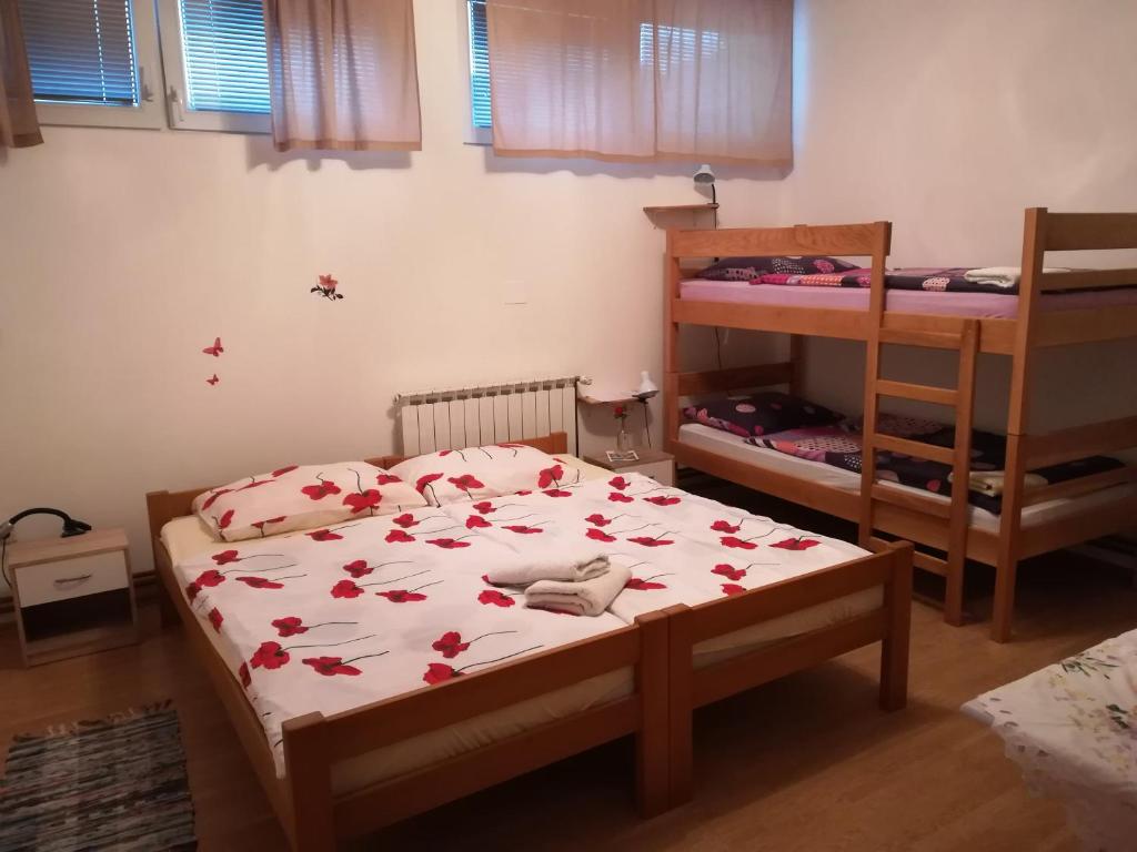 Posteľ alebo postele v izbe v ubytovaní Hostel Poslon