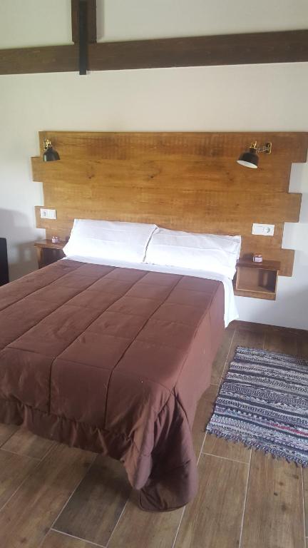 Posteľ alebo postele v izbe v ubytovaní Apartamento del Abuelo