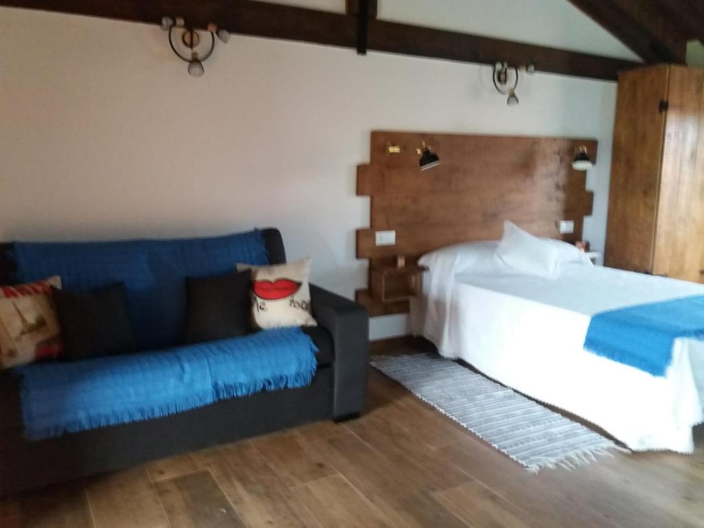 Posteľ alebo postele v izbe v ubytovaní Apartamento del Abuelo
