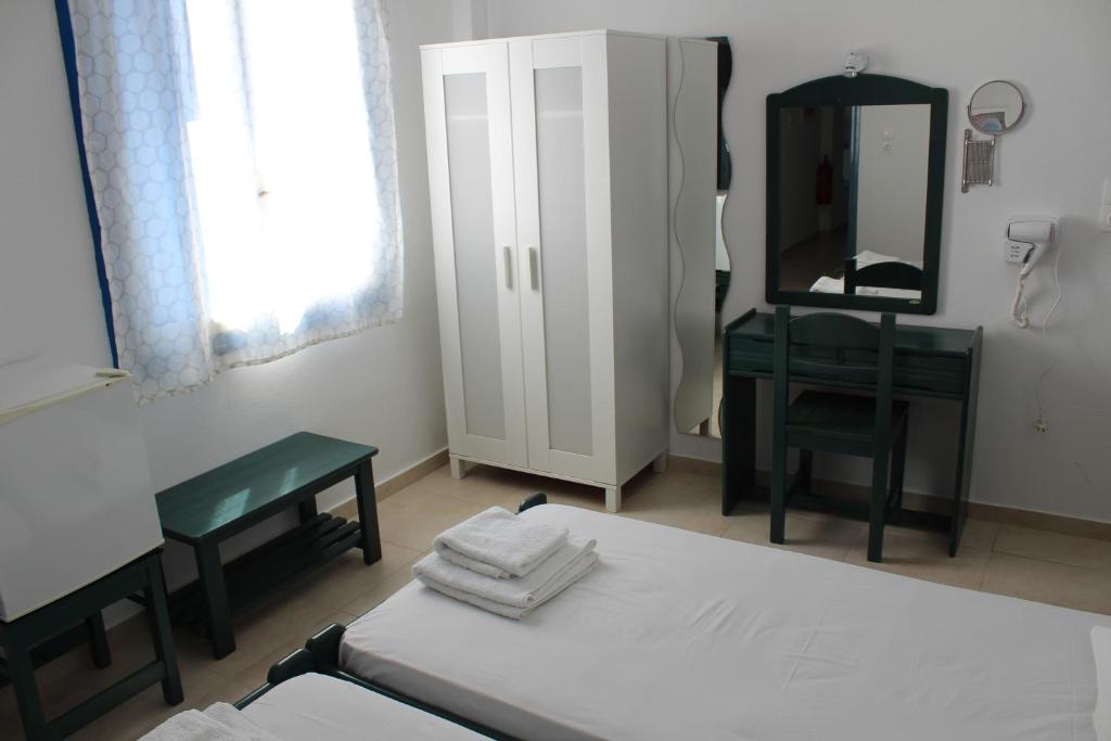 Letto o letti in una camera di Mare Blue Ios