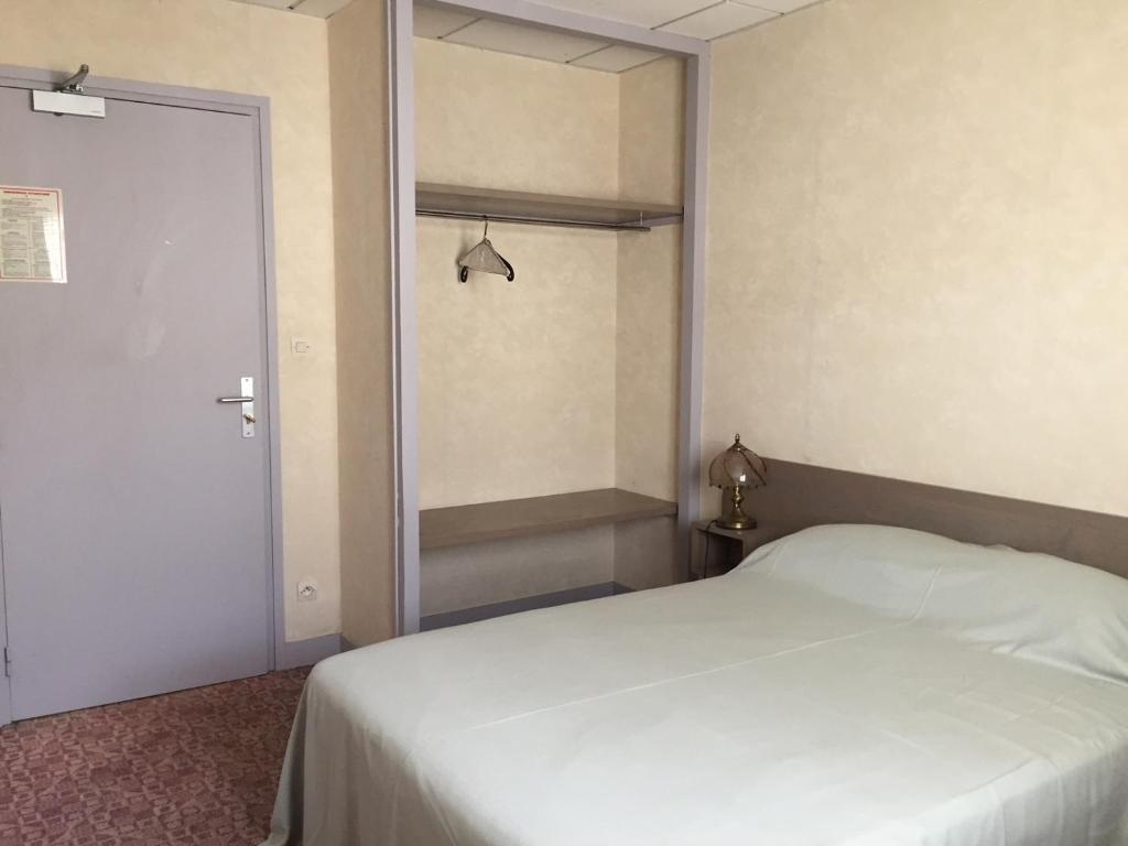 Postel nebo postele na pokoji v ubytování Hôtel Restaurant De La Mare