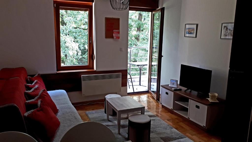 TV in/ali zabaviščno središče v nastanitvi Apartment Blagojevic