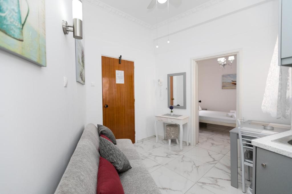 A kitchen or kitchenette at Kallithea Studios