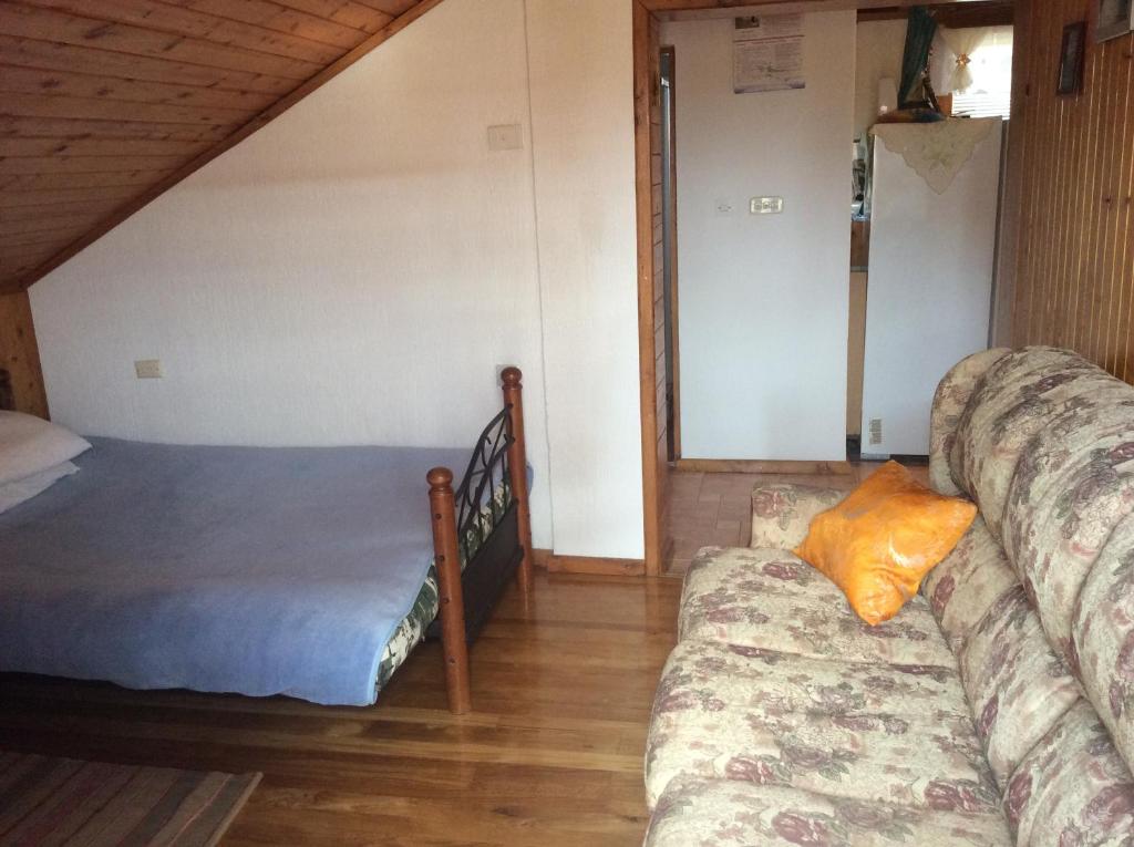 Postel nebo postele na pokoji v ubytování Apartman Nadia