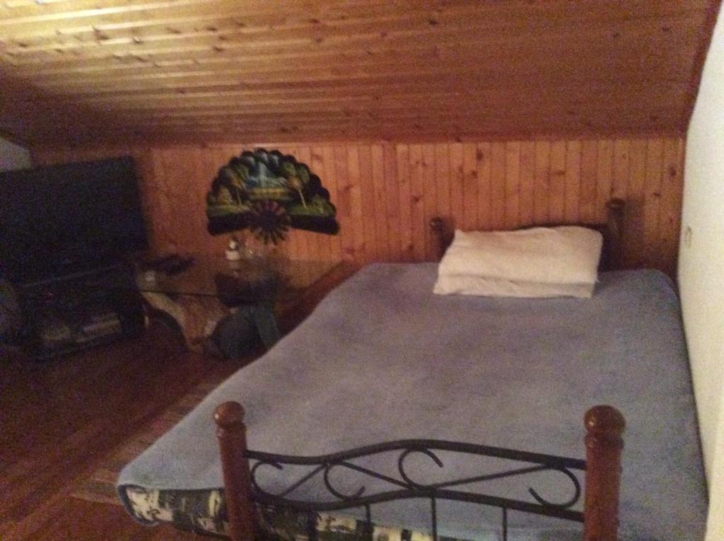 Postel nebo postele na pokoji v ubytování Apartman Nadia