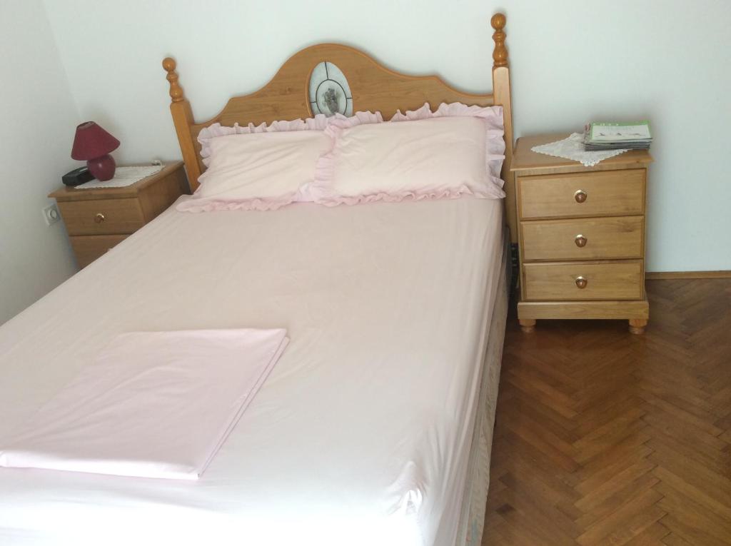 Postel nebo postele na pokoji v ubytování Apartman Nadia
