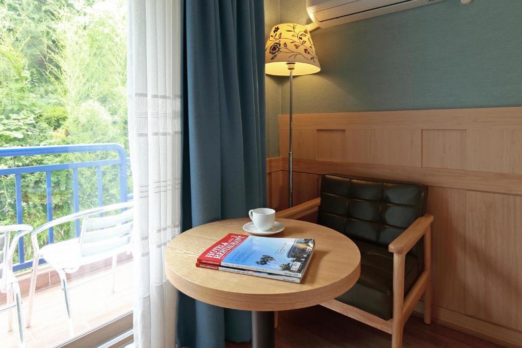 Balkón nebo terasa v ubytování Benikea Swiss Rosen Hotel