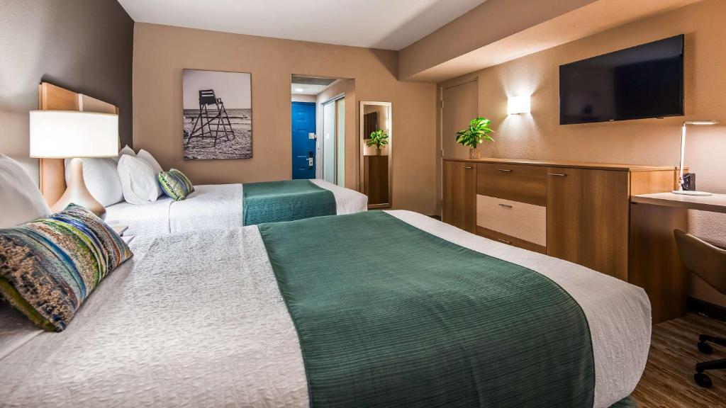 Postel nebo postele na pokoji v ubytování Best Western Plus Atlantic Beach Resort