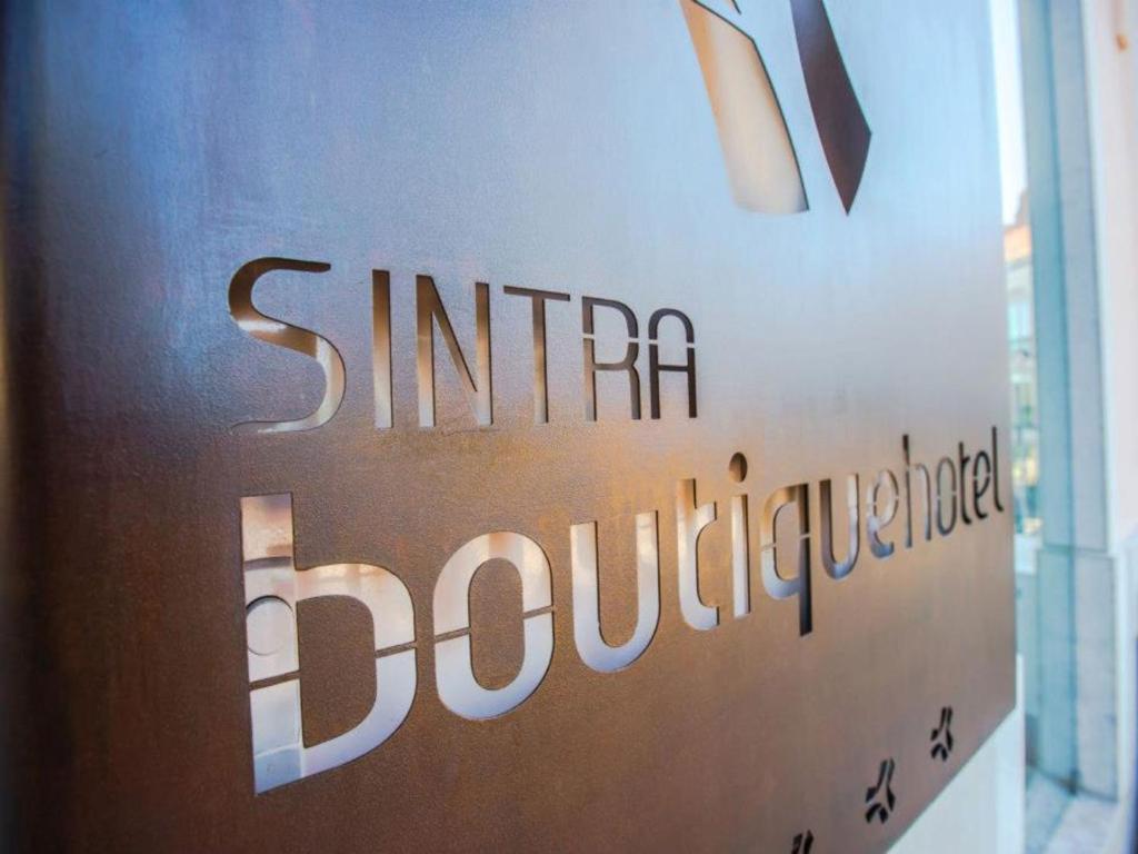 a sign for a sintra book store at Sintra Boutique Hotel in Sintra