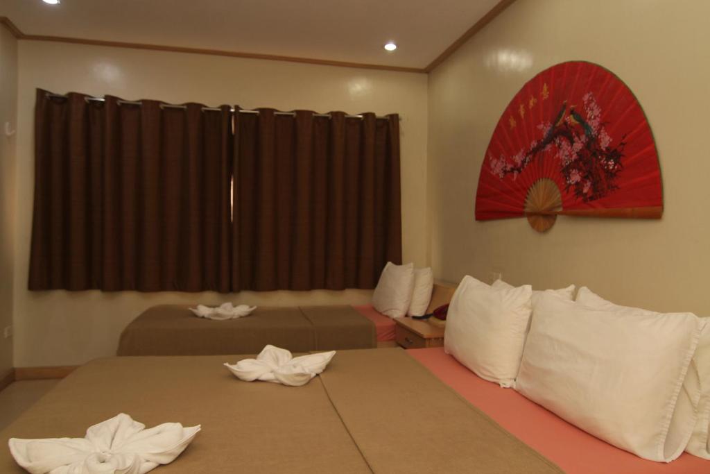Postel nebo postele na pokoji v ubytování Casa Rosario Hotel