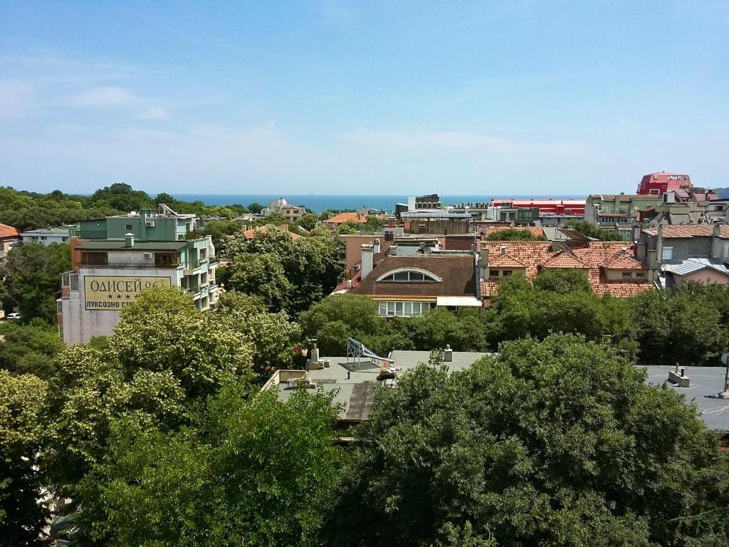 a view of a city with trees and buildings at Horizon Apartment in Varna City