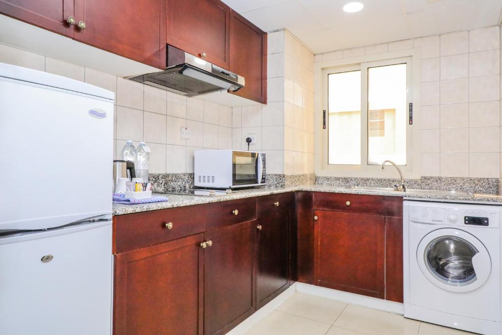 Kuchyň nebo kuchyňský kout v ubytování Savoy Crest Aparthotel, Bur Dubai