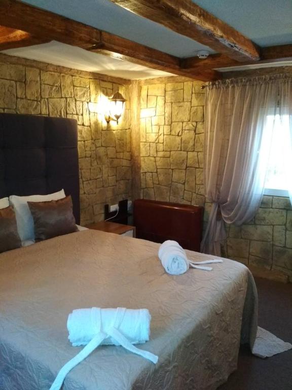 Postel nebo postele na pokoji v ubytování Отель БЕССАРАБИЯ