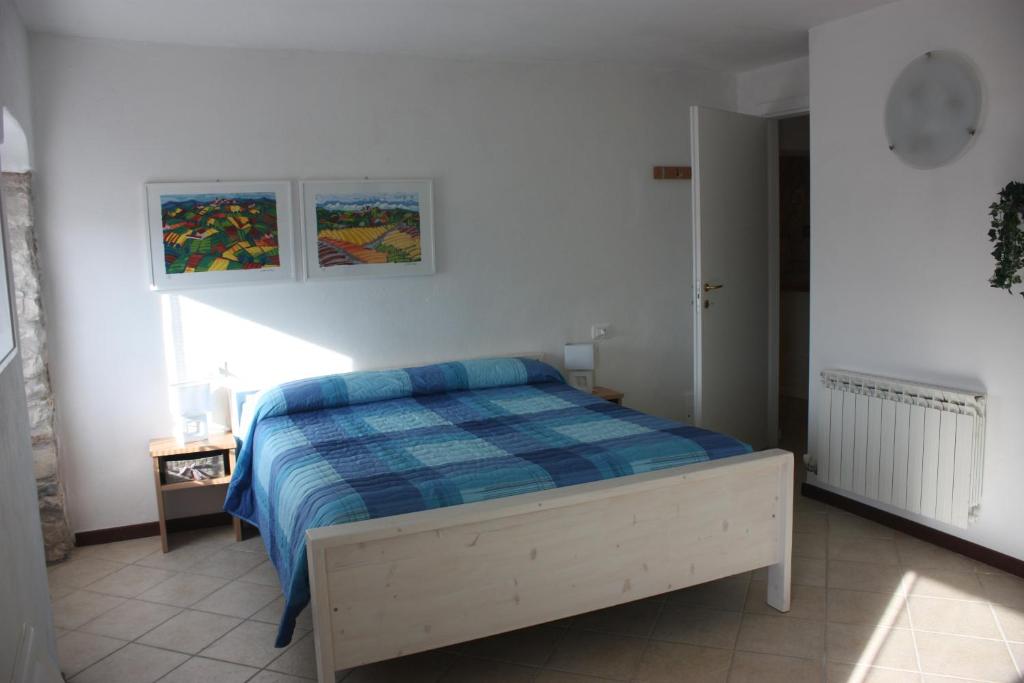 Łóżko lub łóżka w pokoju w obiekcie B&B Brixius