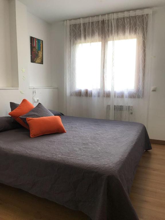 Postel nebo postele na pokoji v ubytování CAL PAU Guardiola de Berguedà