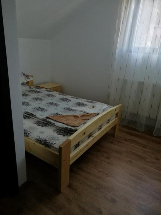 Postel nebo postele na pokoji v ubytování Pensiunea ,,Suciu"