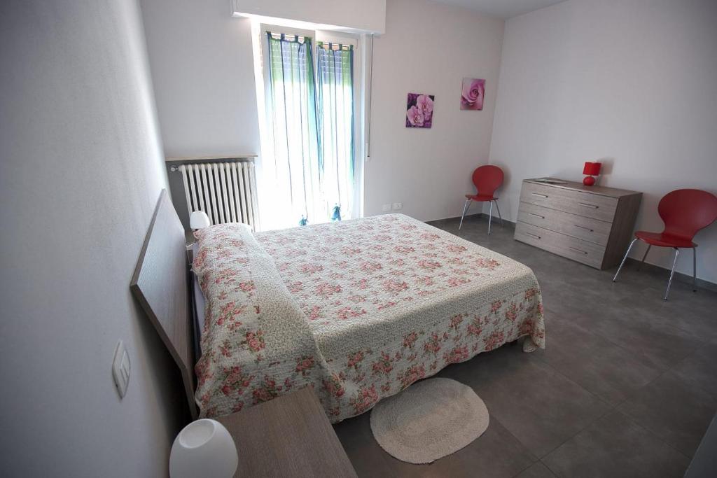 A bed or beds in a room at Casa Lorenzo