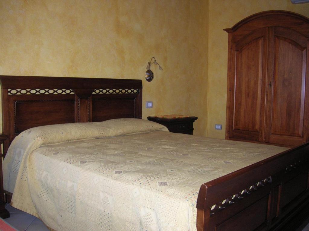Posteľ alebo postele v izbe v ubytovaní Agriturismo Colombarola