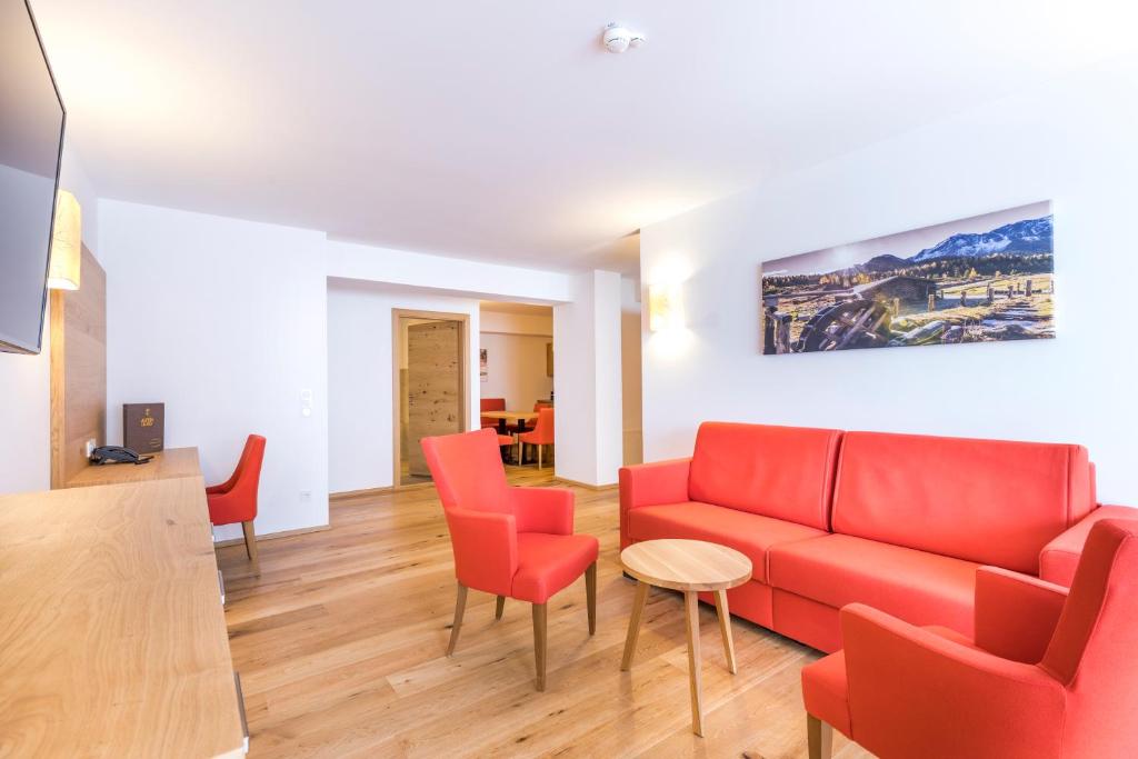 Posezení v ubytování Hotel Alpenland