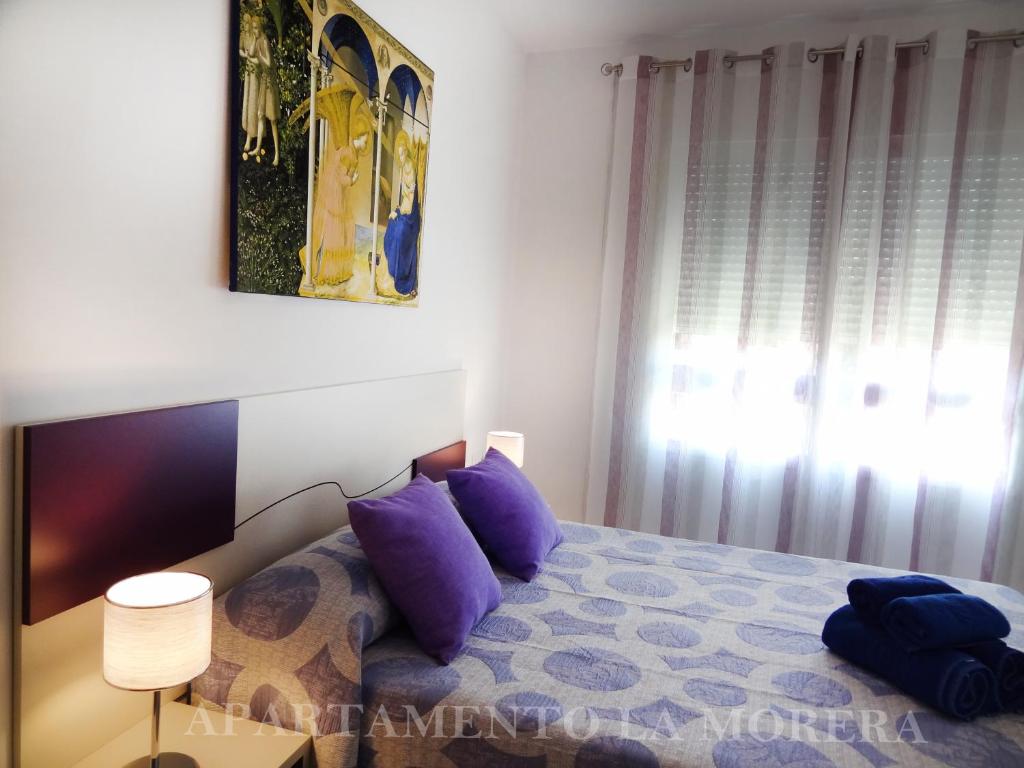 Posteľ alebo postele v izbe v ubytovaní Apartamento La Morera