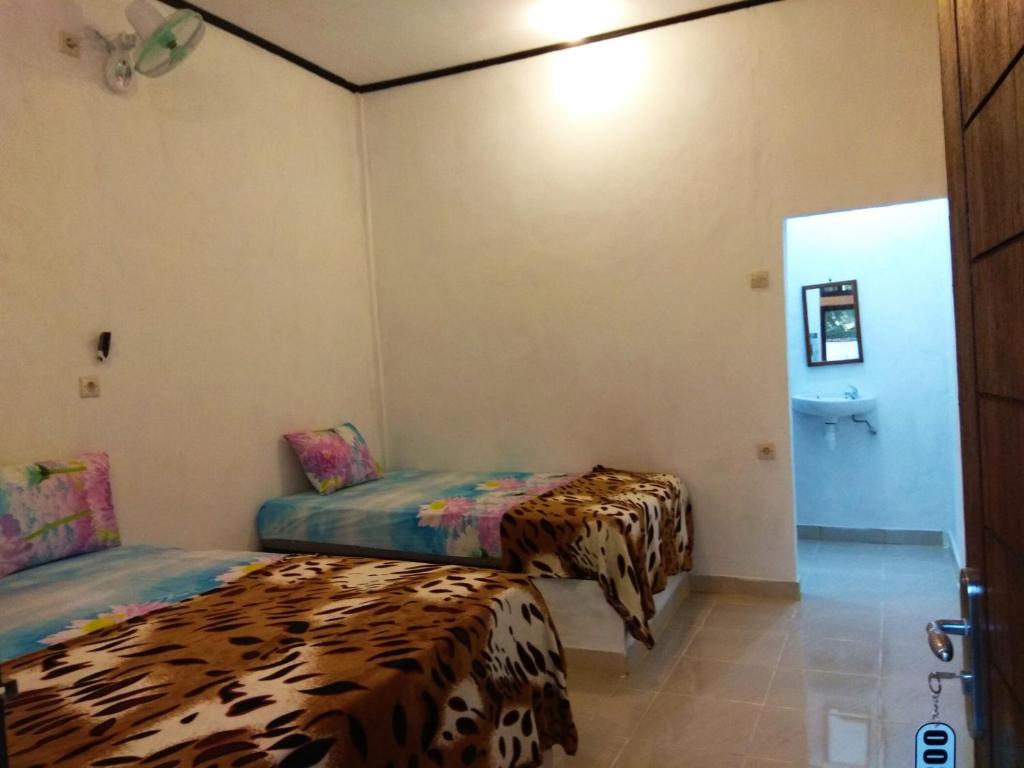 Nanda Homestay - Luxe Drievoudige Kamer