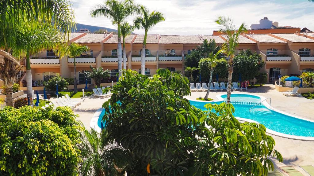 Bazén v ubytování Apartamentos Jardín del Conde nebo v jeho okolí