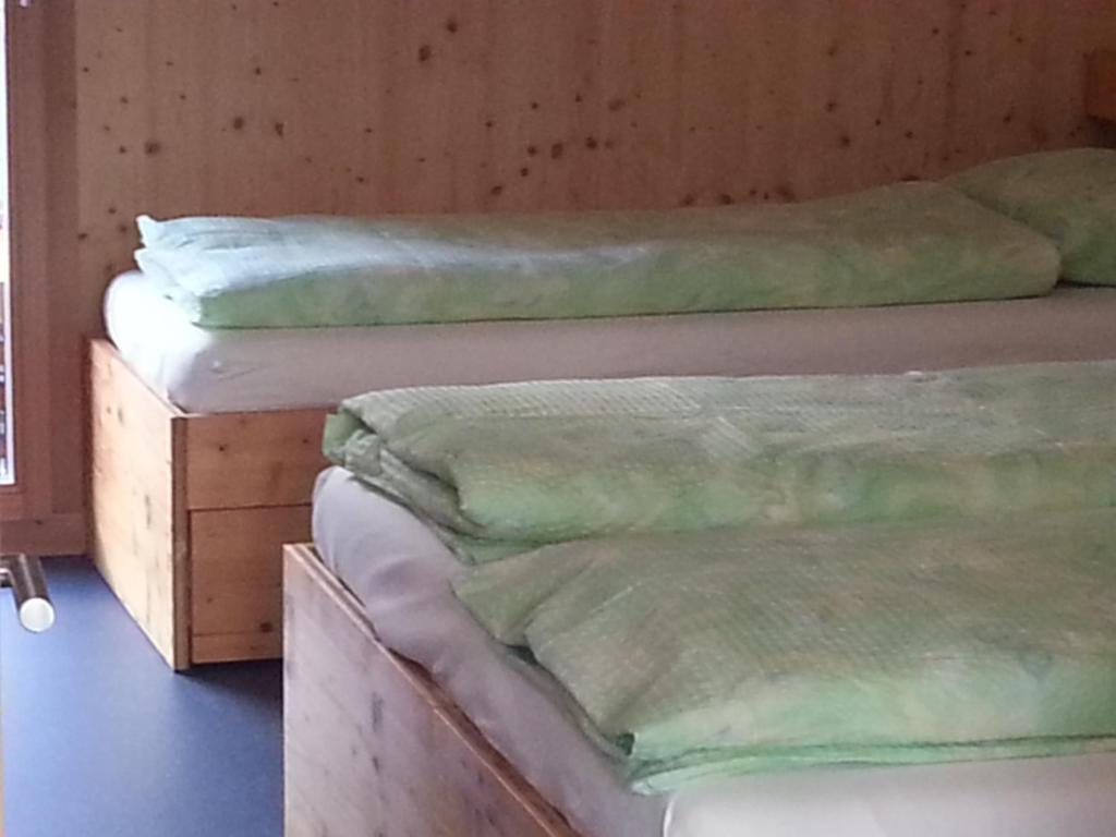 Postel nebo postele na pokoji v ubytování Familienhotel Campagna