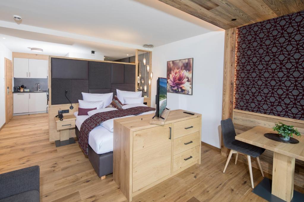 Postel nebo postele na pokoji v ubytování Wagner's Aparthotel