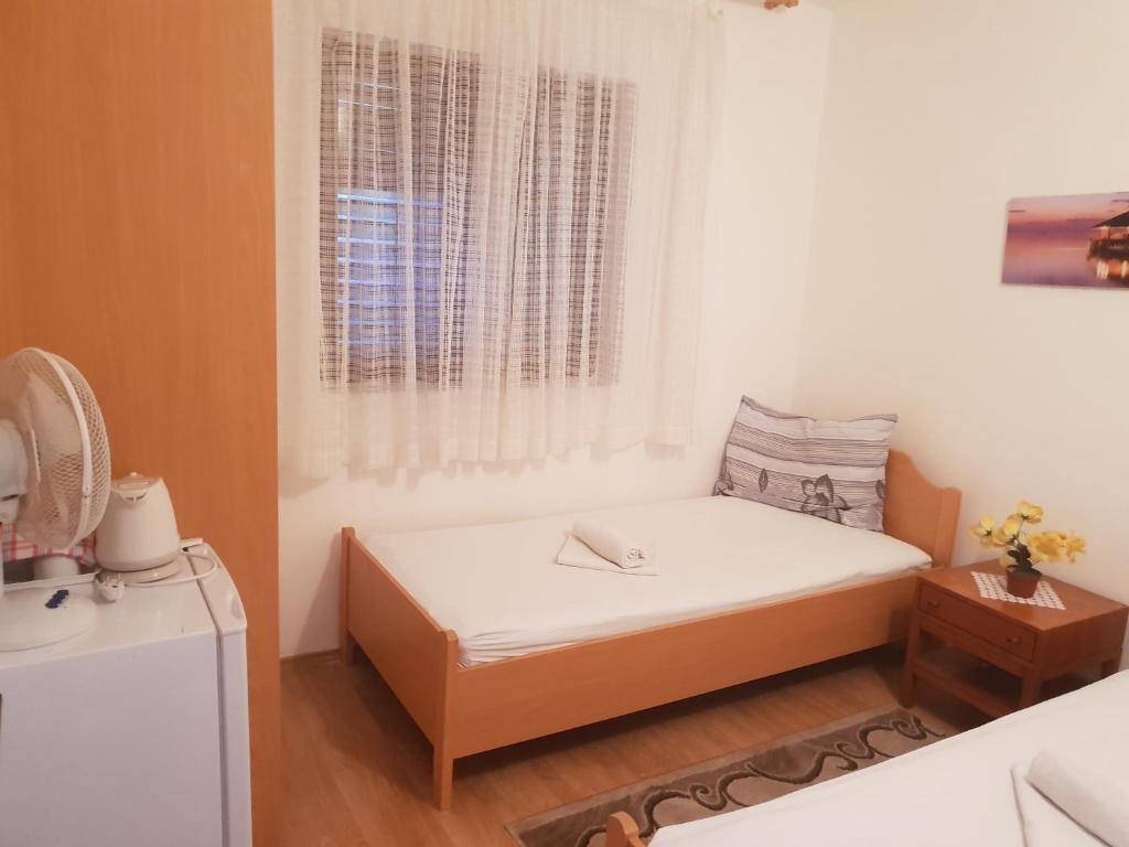 Postel nebo postele na pokoji v ubytování Guest House Alisa
