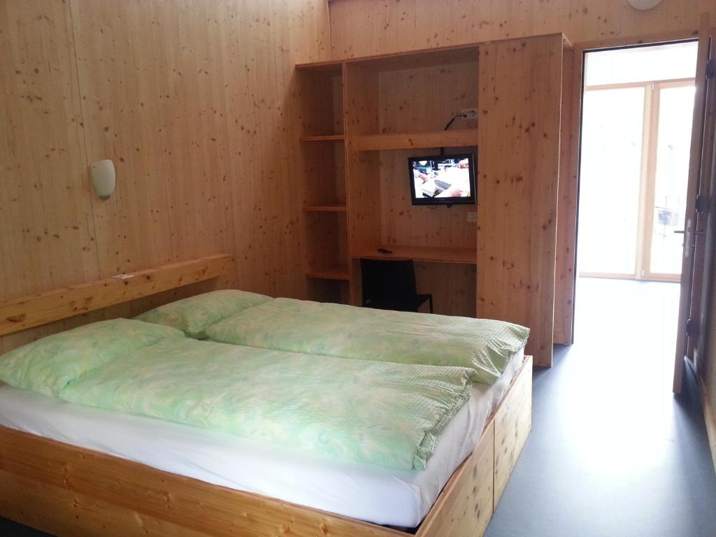 Postel nebo postele na pokoji v ubytování Familienhotel Campagna