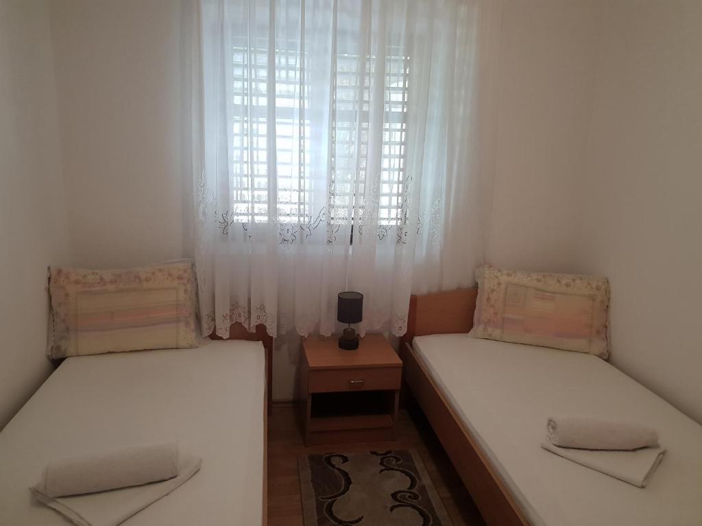Postel nebo postele na pokoji v ubytování Guest House Alisa