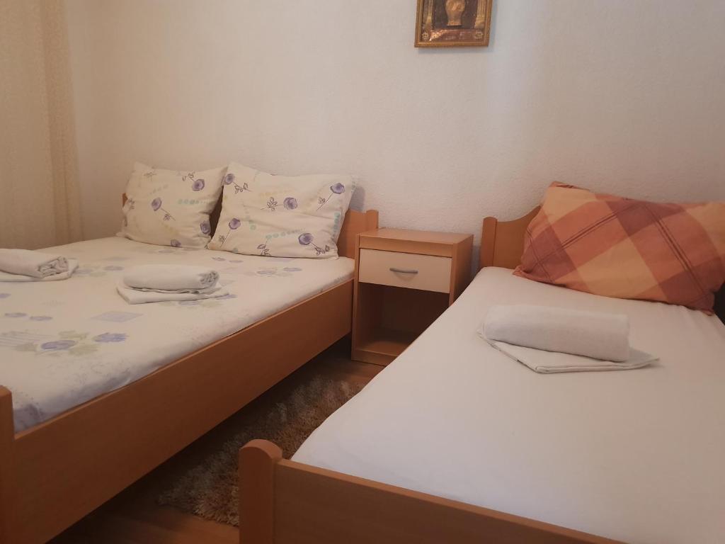 Postel nebo postele na pokoji v ubytování Guest House Alisa