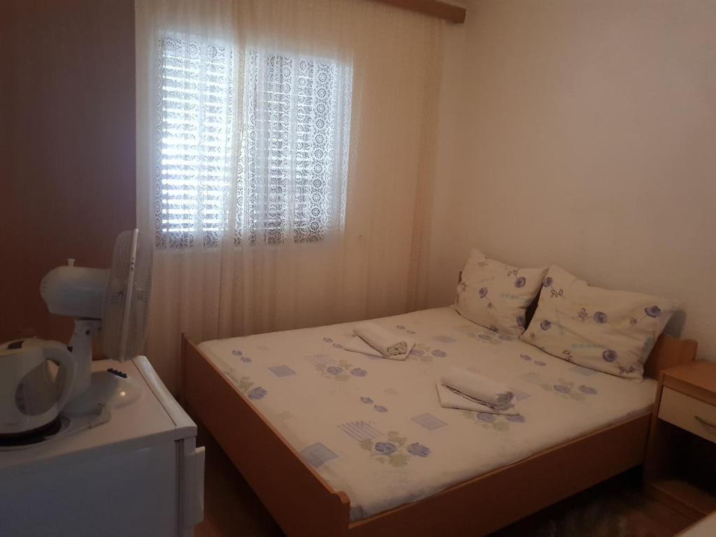 Postel nebo postele na pokoji v ubytování Guest House Alisa