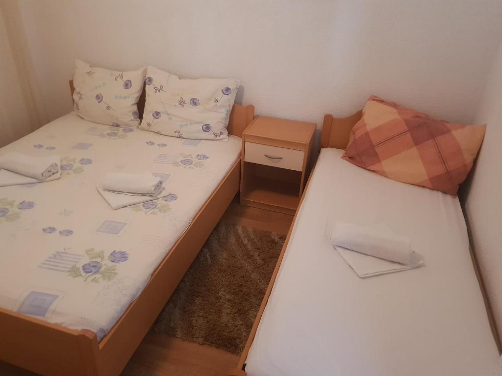 Postel nebo postele na pokoji v ubytování Guest House Alisa
