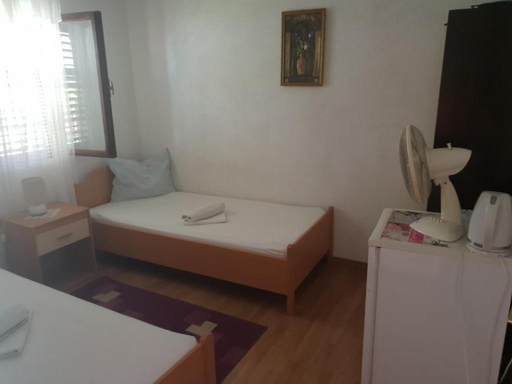 Postel nebo postele na pokoji v ubytování Guest House Alisa