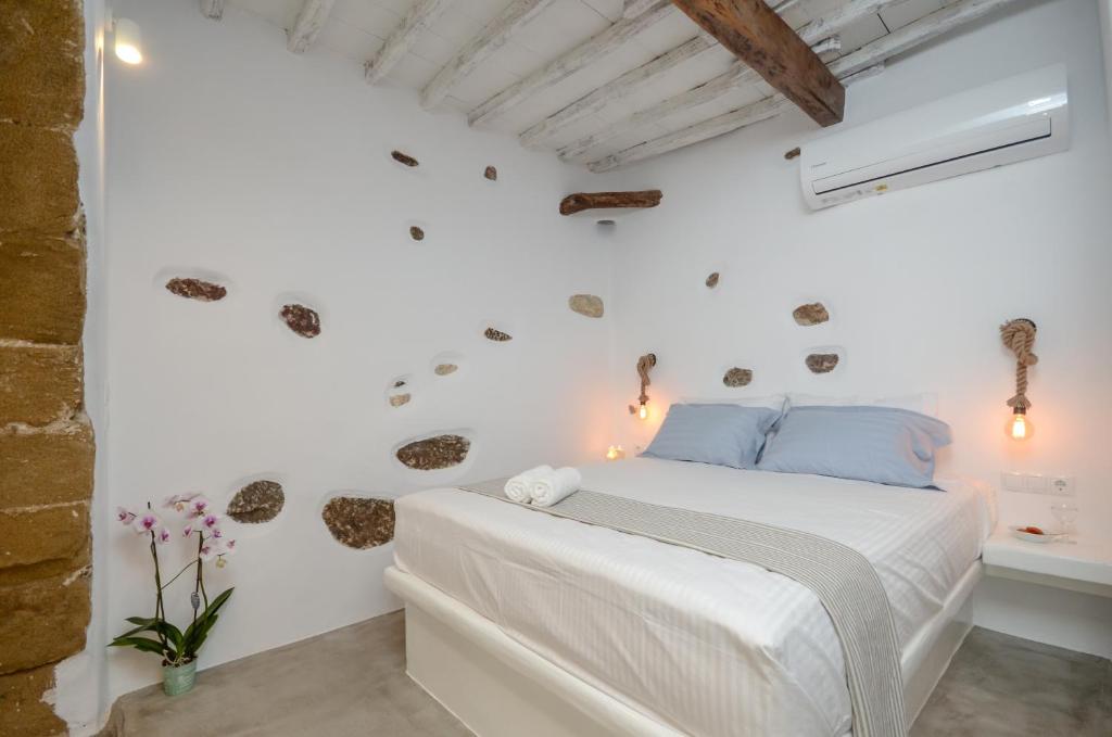 Postel nebo postele na pokoji v ubytování Venetian Suites
