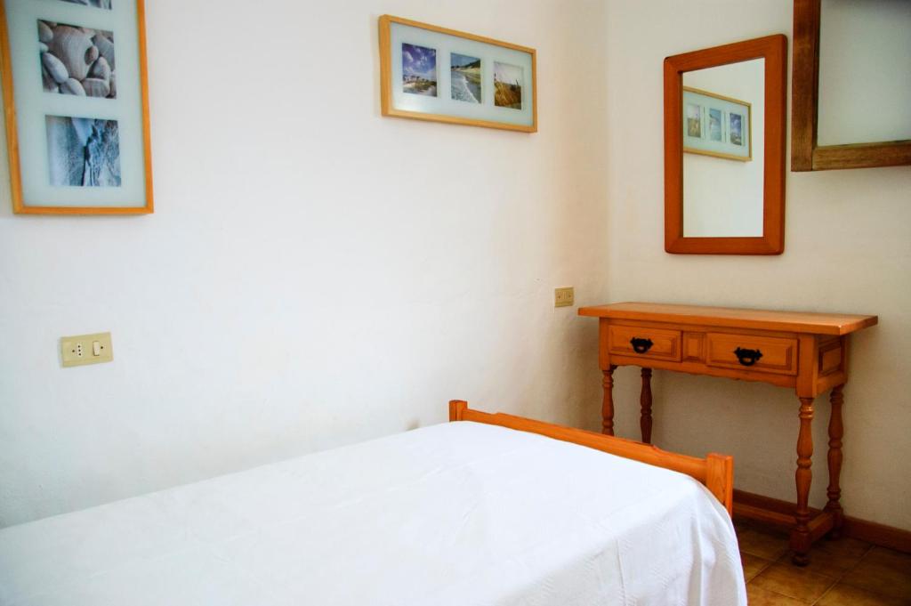 A bed or beds in a room at Seaview Risco de Famara 1