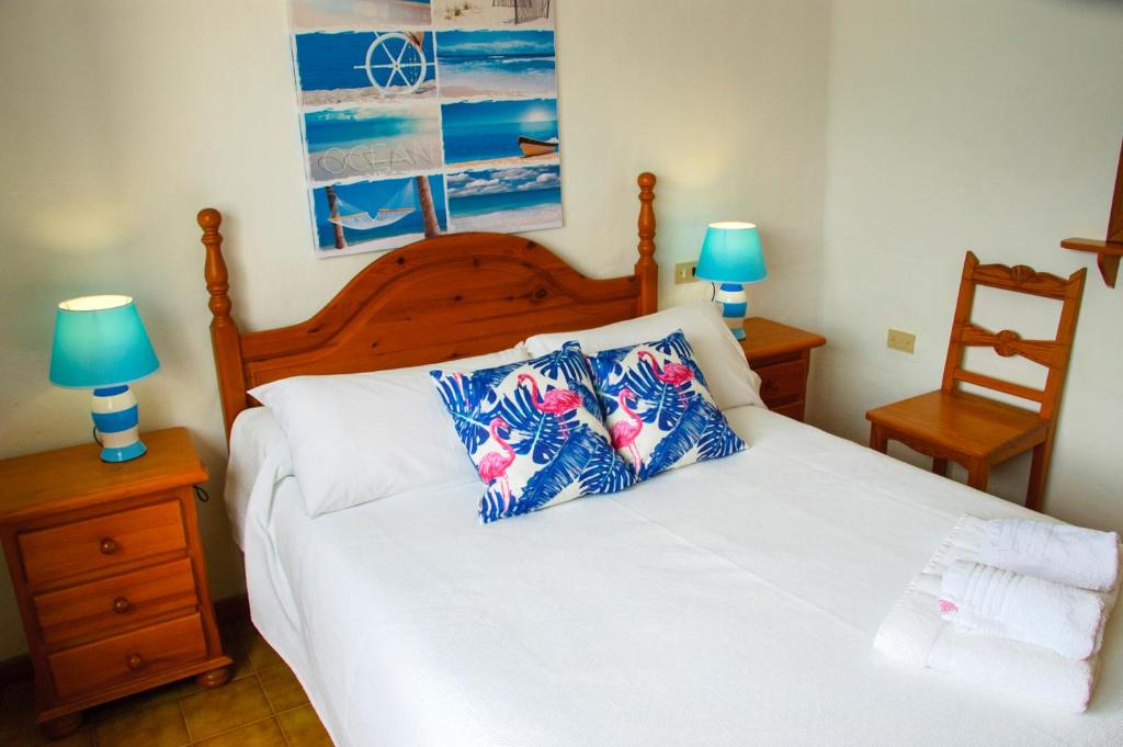 A bed or beds in a room at Seaview Risco de Famara 1