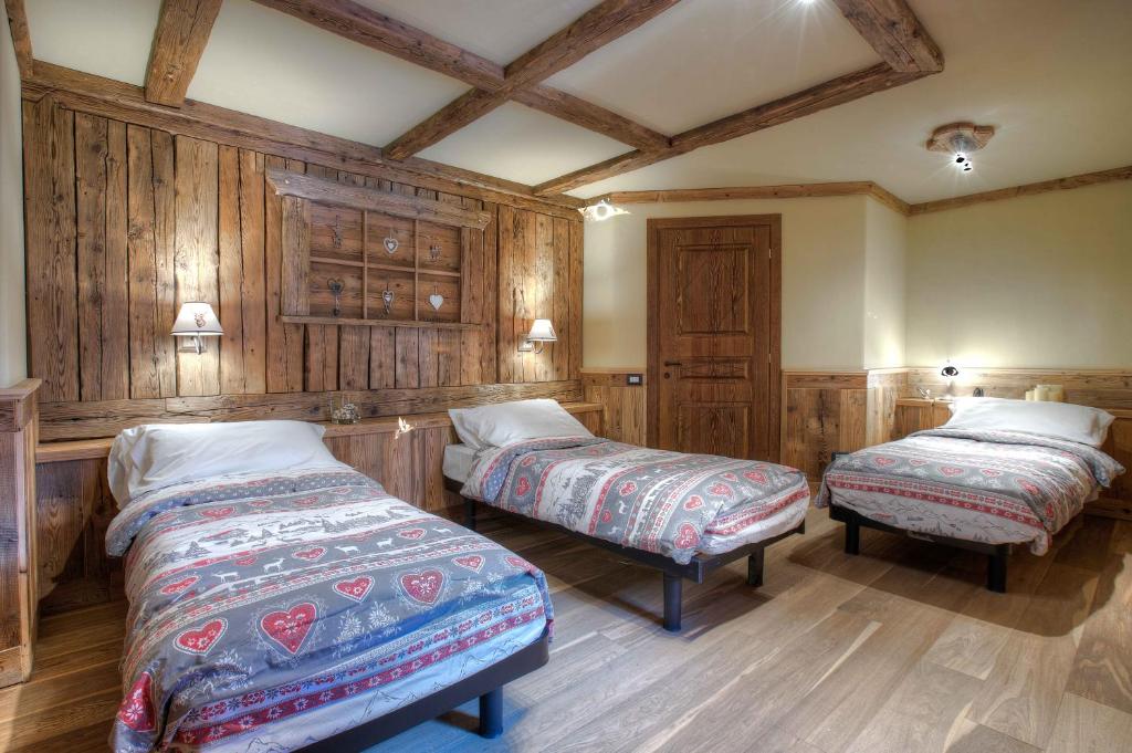 Postel nebo postele na pokoji v ubytování Hotel Meublé Mon Rêve