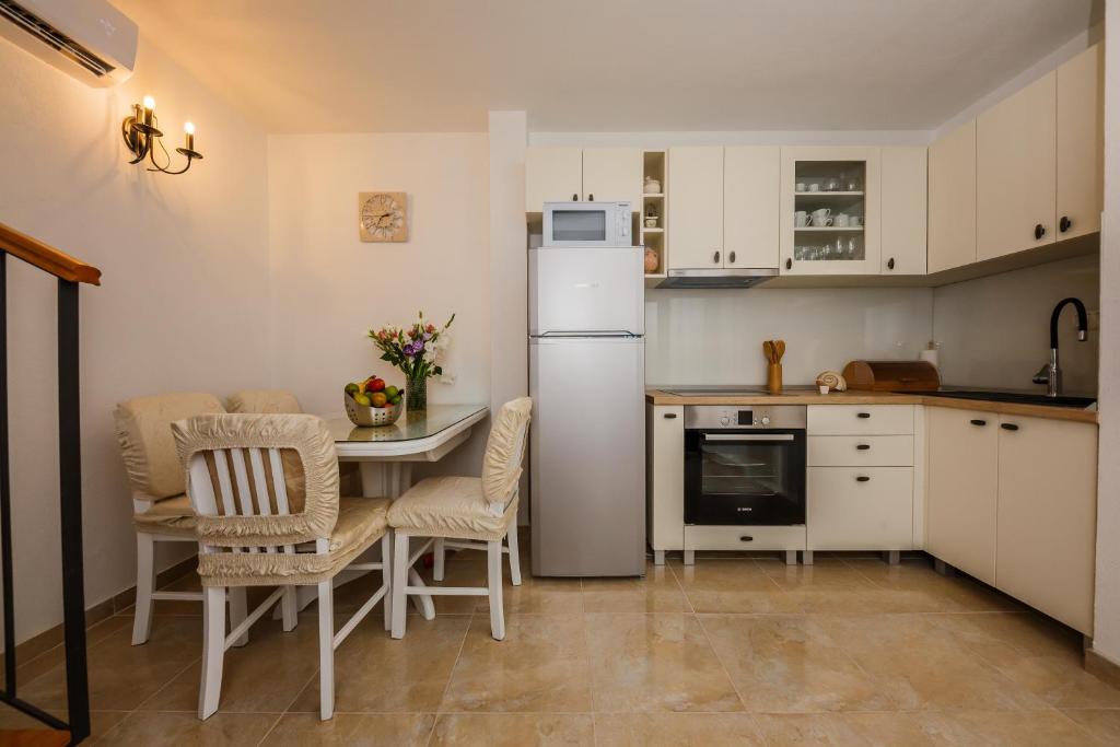 Kuchyň nebo kuchyňský kout v ubytování Apartman Mare