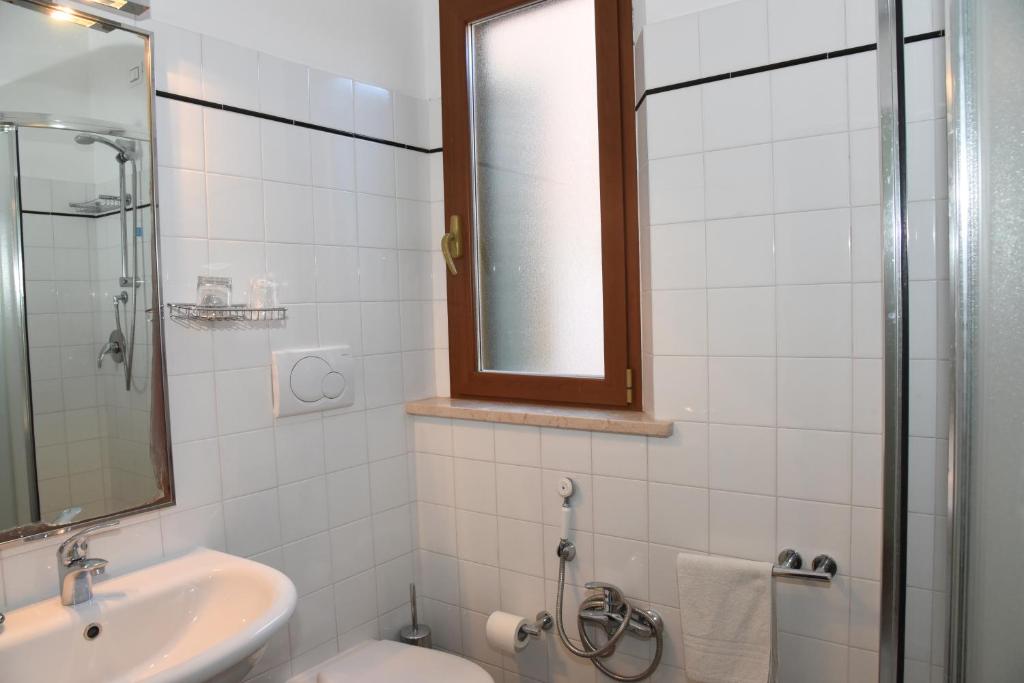 Koupelna v ubytování Albergo La Rosetta