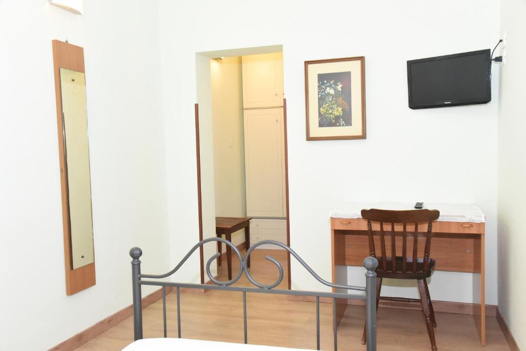 TV a/nebo společenská místnost v ubytování Albergo La Rosetta