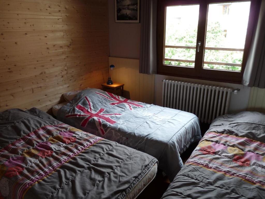 Postel nebo postele na pokoji v ubytování Chalet Le Bois Noir
