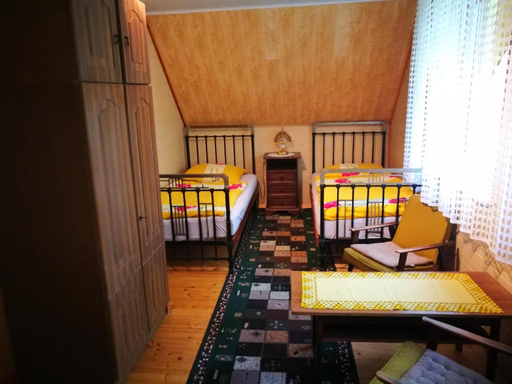 Letto o letti in una camera di Agrowczasy u Mirusi