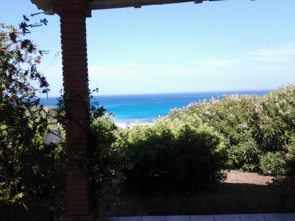 a view of the ocean from a house at Cottage Fuile 'E Mare in Orosei