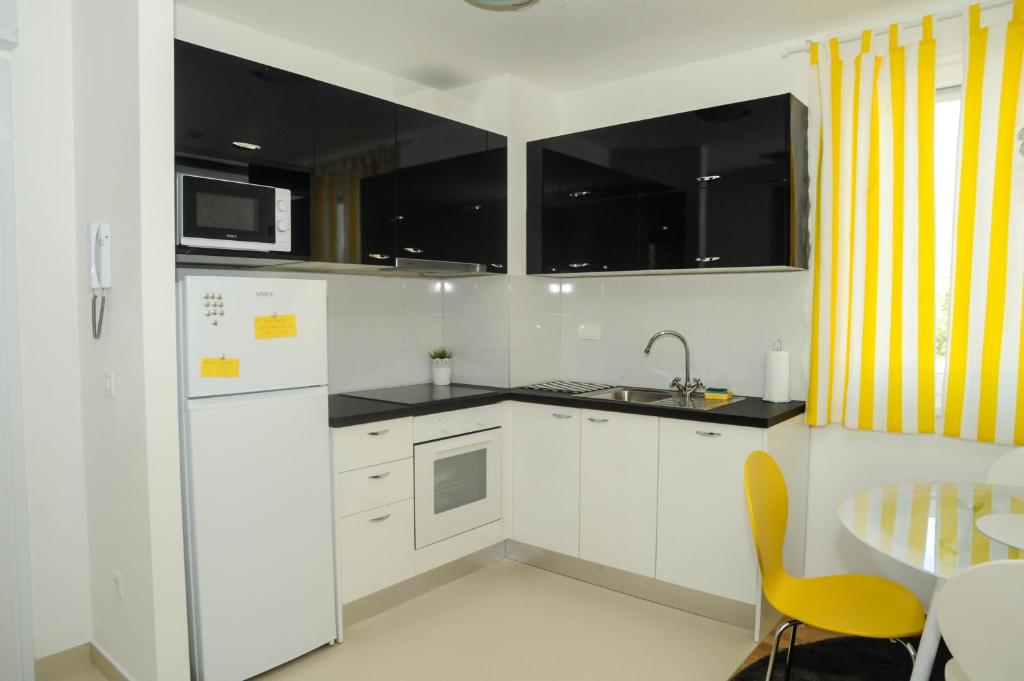 Kuchyňa alebo kuchynka v ubytovaní Golden Gate Apartment Zadar
