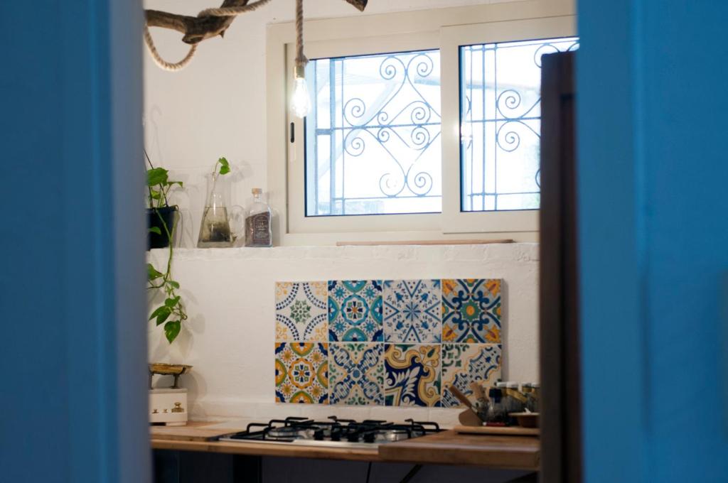 A kitchen or kitchenette at Addumari